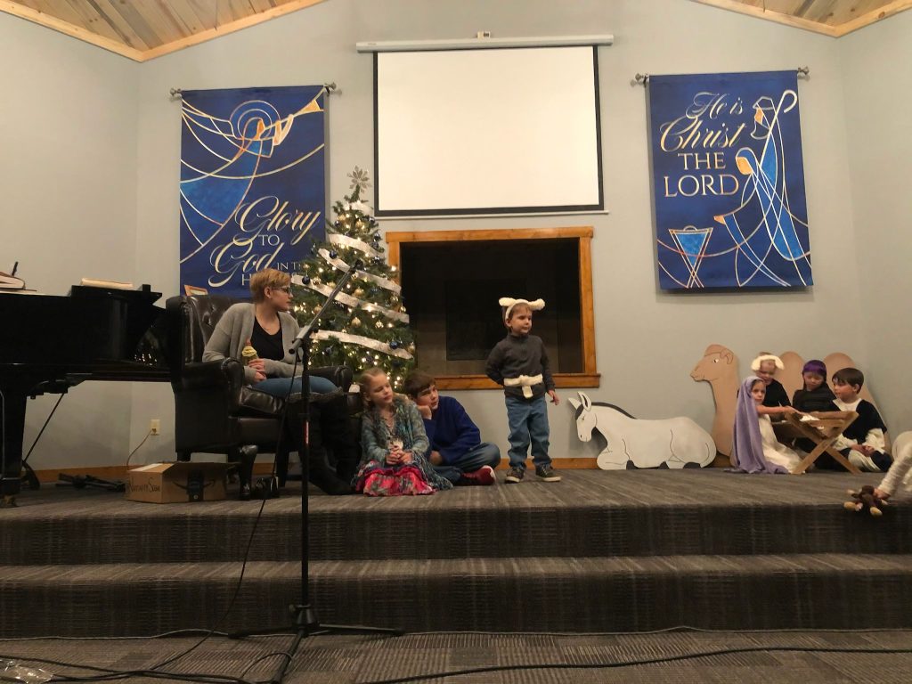 Children taking part in a Christmas program in the First Baptist Church sanctuary